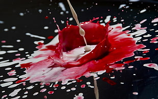 time lapse photography of red and white paint